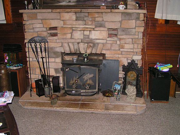 Woodburning fireplace with insert