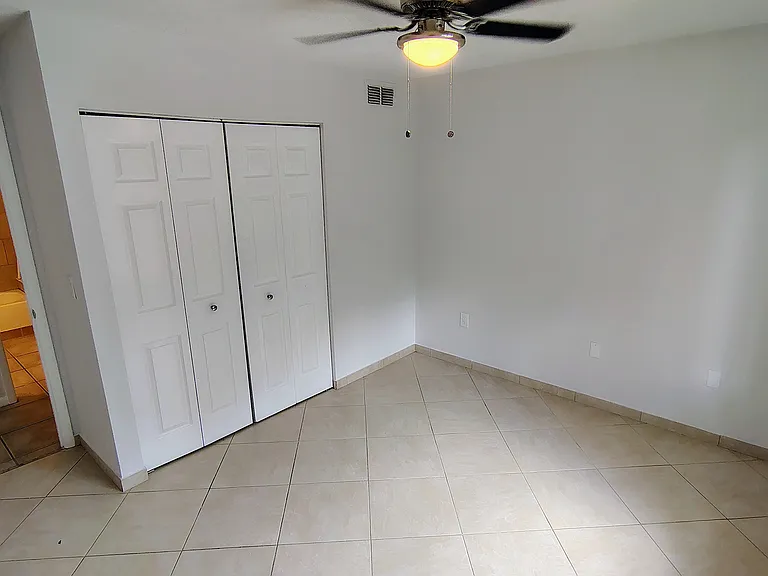 2nd bedroom also w/view of preserve, across from 2nd bath; new ceiling fan