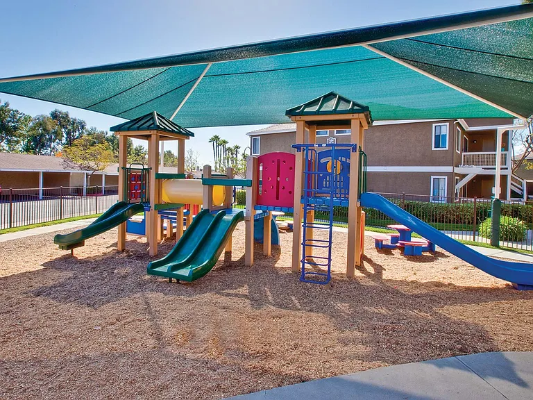 Children can play close-by on our community playground