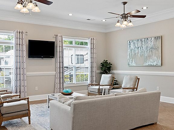 Experience comfort and style in this beautifully designed living room.