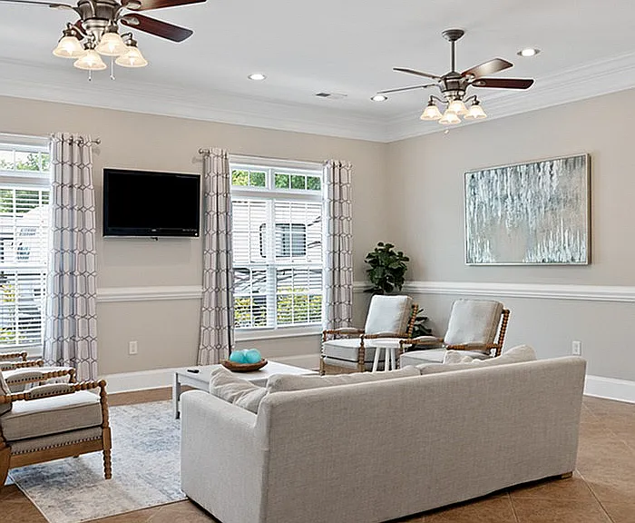 Experience comfort and style in this beautifully designed living room.