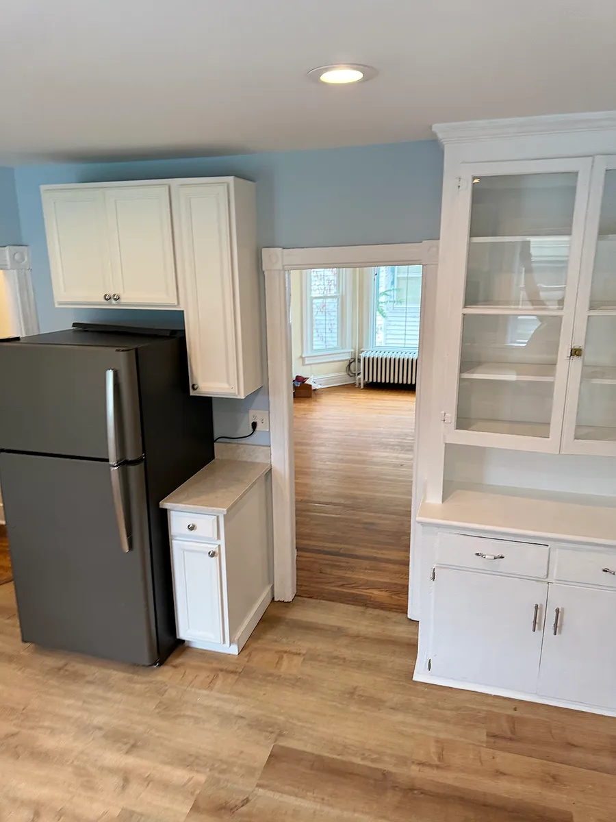 Renovated Kitchen with Quartz Counter Top, GE Refrigerator, New and Restored Cabinetry, Freshly painted with new hardware. - 206 Main St #2
