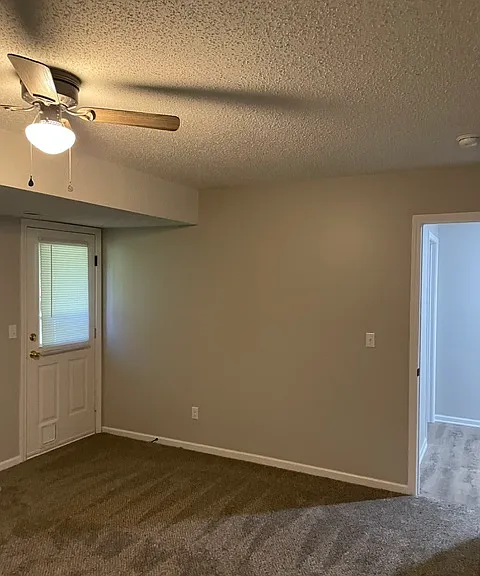 Lower bedroom with walkout to backyard