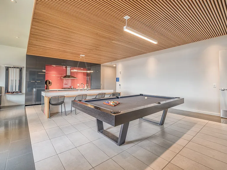 Clubroom for guests with games, seating, and more