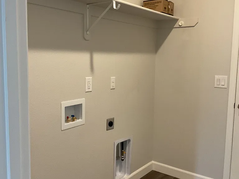 Laundry room, with door into garage