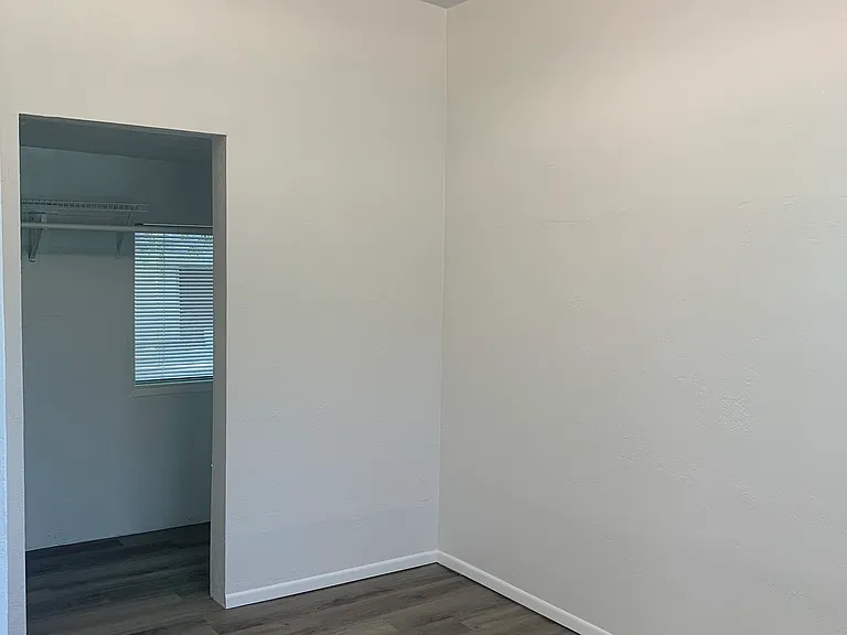 Bedroom with walk-in closet