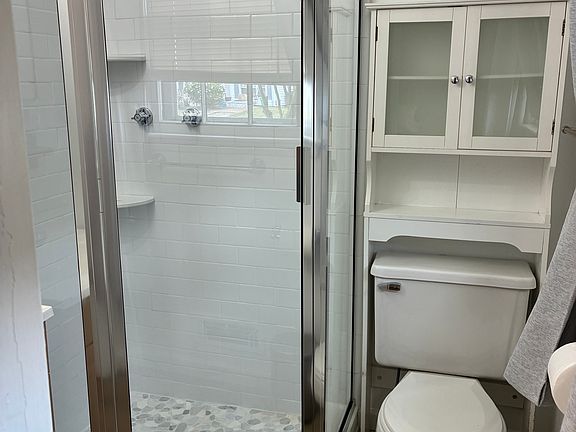 Master bath with new shower added May 2025.