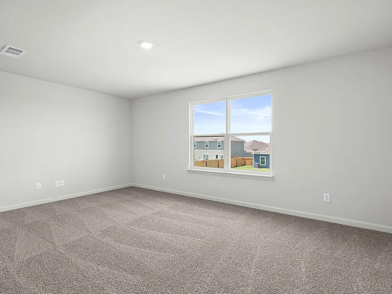 The upstairs loft is a versatile space for the family to utilize to fit their needs.