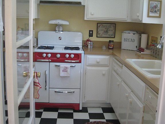 darling kitchen with new black & white flooring