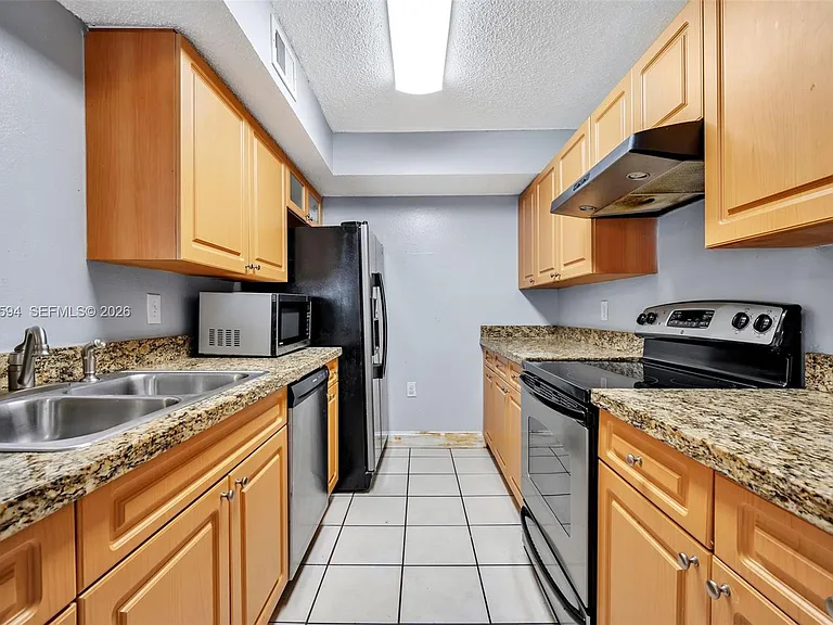 15560 SW 104th Ter #611 — Photo 9