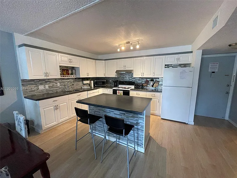 2061 NW 47th Ter #205 — Photo 38