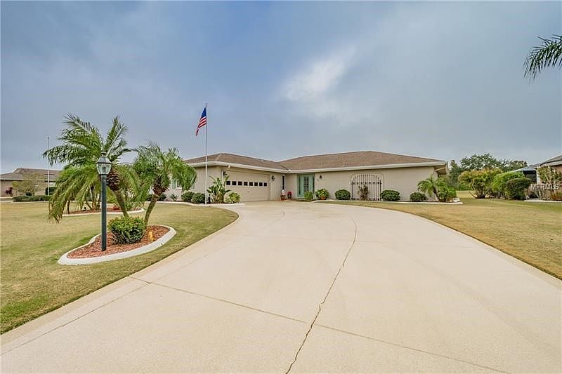 Long curved driveway takes you to your new home !