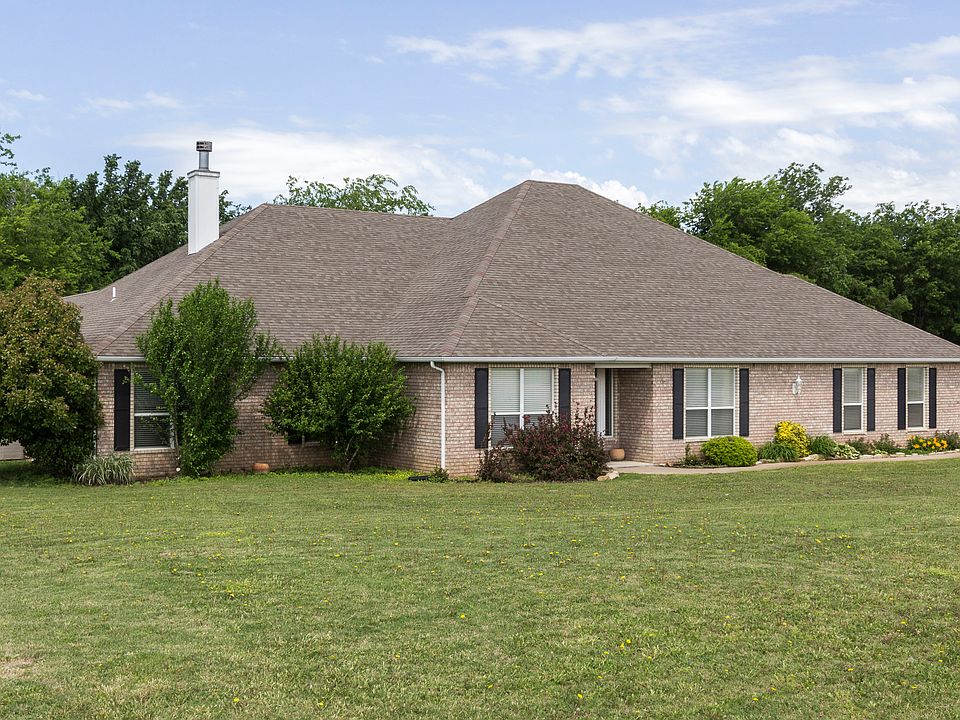 Full brick with lots of living space!  One acre with wooded back area. 4 bdrms, 3.5 baths, oversized two-car and saltwater diving pool.