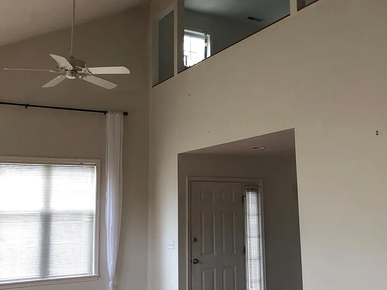 Front door and spacious foyer.