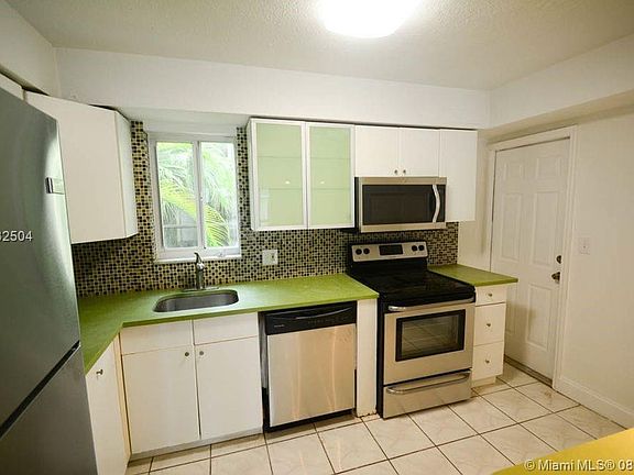3rd image of 9971 W Bay Harbor Dr APT 207