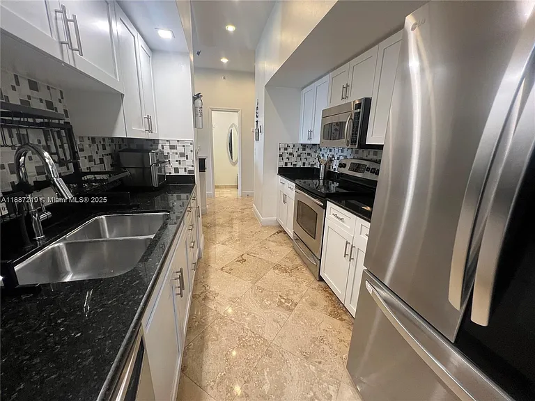 6917 Collins Ave — Photo 13