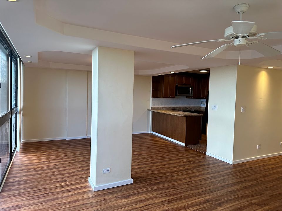 Living Room Facing Dining Room and Kitchen
