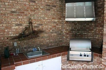 Outdoor Kitchen by the pool!
						:
						Great place to host dinner with friends by the pool!