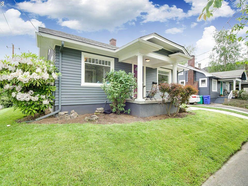 Light-filled corner lot with lawn, driveway, and garage. Backyard patio provides privacy and a great place to unwind or entertain friends