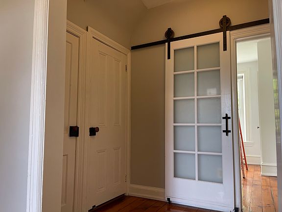 Hallway (2 closet, sliding barn door to bedroom)