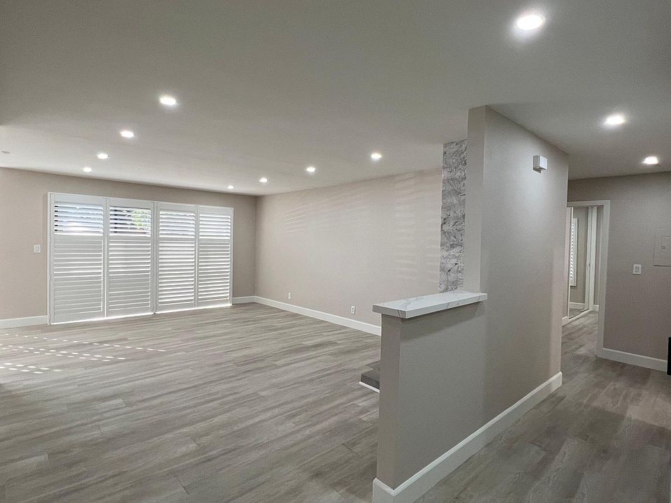 Living Room and Hallway from entry way.