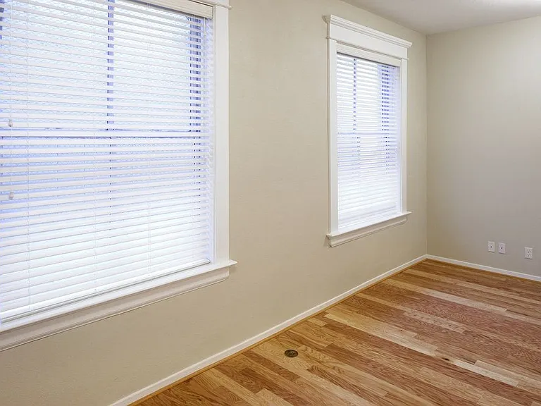 Bedroom with two windows