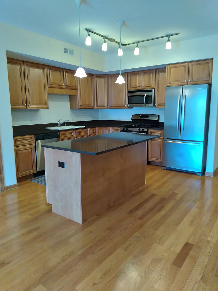 Building Photo - 5761 W Higgins Ave #3D