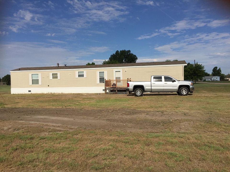 Front Yard from East side (this is an old picture of house, it's been resided)