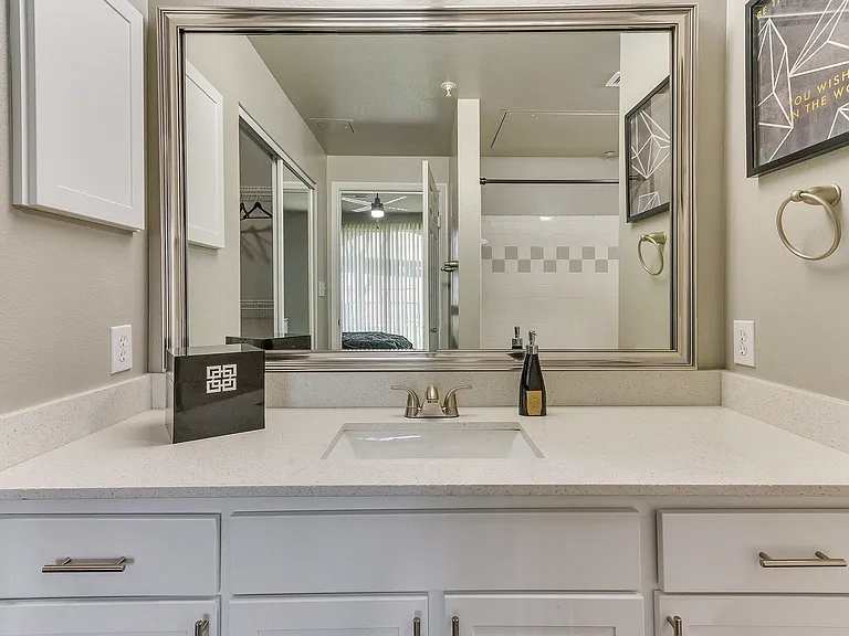 Garden soaking tubs and plentiful storage in bathrooms.