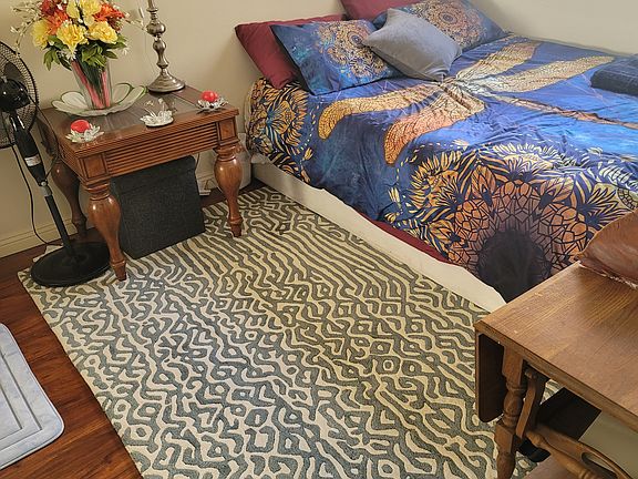 Smaller bedroom with queen bed