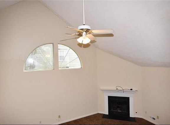 corner fireplace and vaulted ceilings