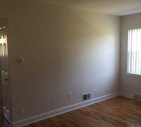 living room with original hardwood floors