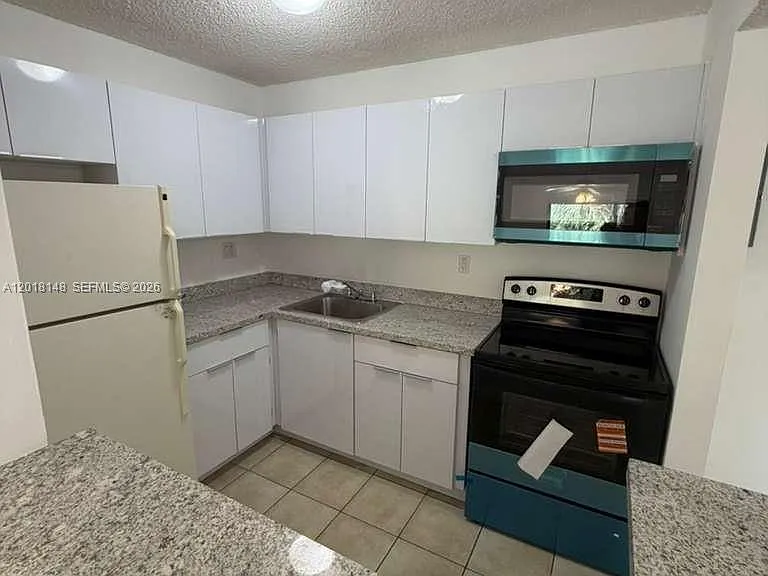 7160 NW 179th St #310 — Photo 10