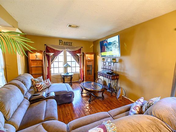 Beautiful front room with natural light.