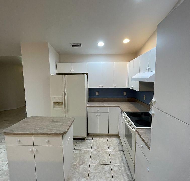 Kitchen with island and lots of storage