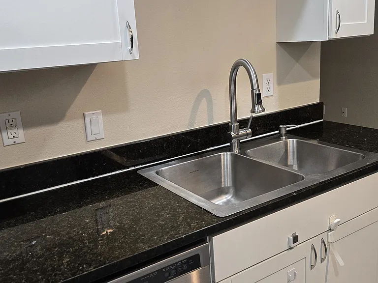 Sleek quartz countertops for a modern, upscale finish