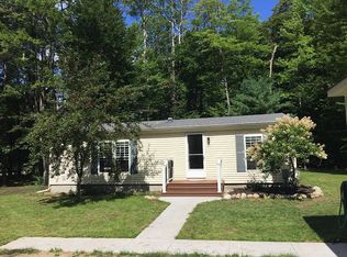 9861 Pine Circle Dr NW, Rapid City, MI 49676