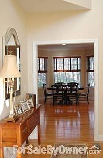 View from Front Entrance
						:
						Custom Wood Blinds throughout Kitchen offer finished look and plenty of light