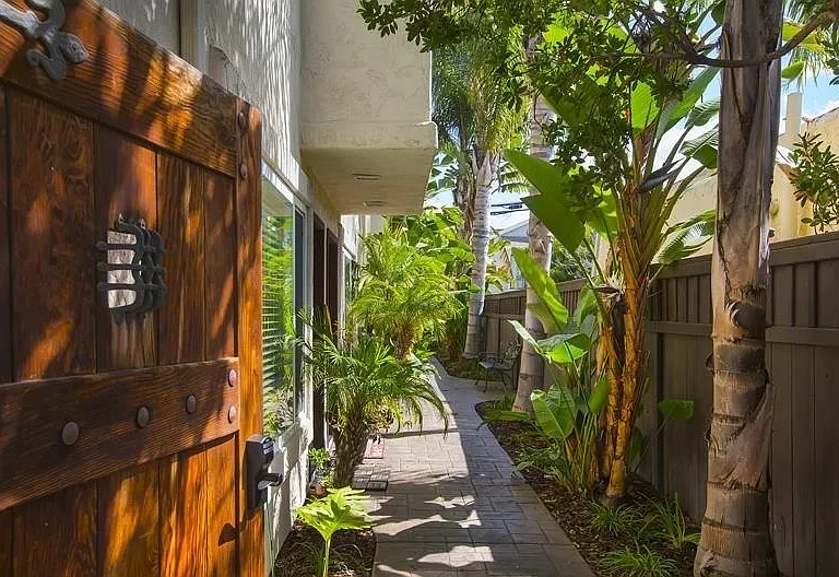 Inside the gate and into the 4 units.