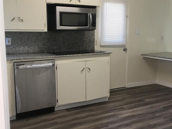 Kitchen with door access to court yard