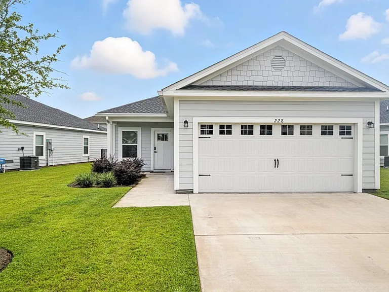 228 Speckled Trout Ln N — Photo 1