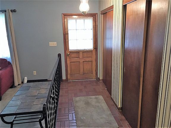 The nice wide entry contains 2 closets and opens to the living room.