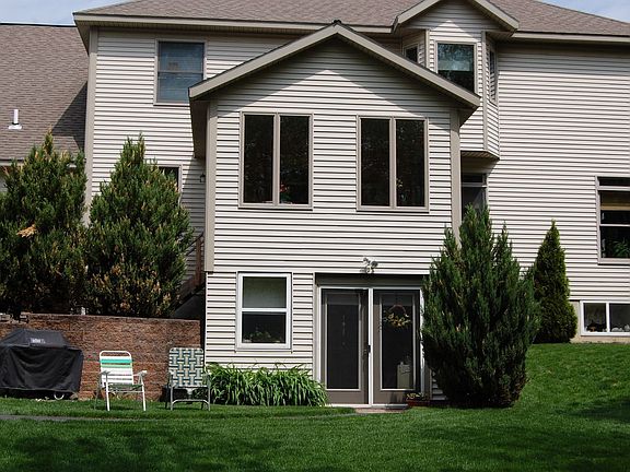 rear view with apartment entrance