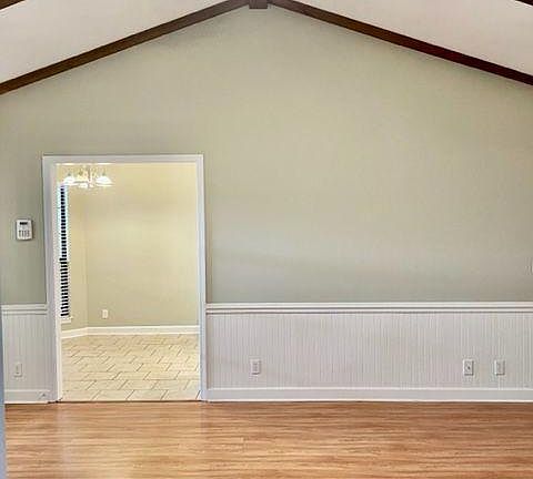 Den looking into the kitchen.