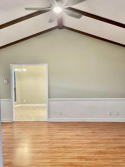 Den looking into the kitchen.