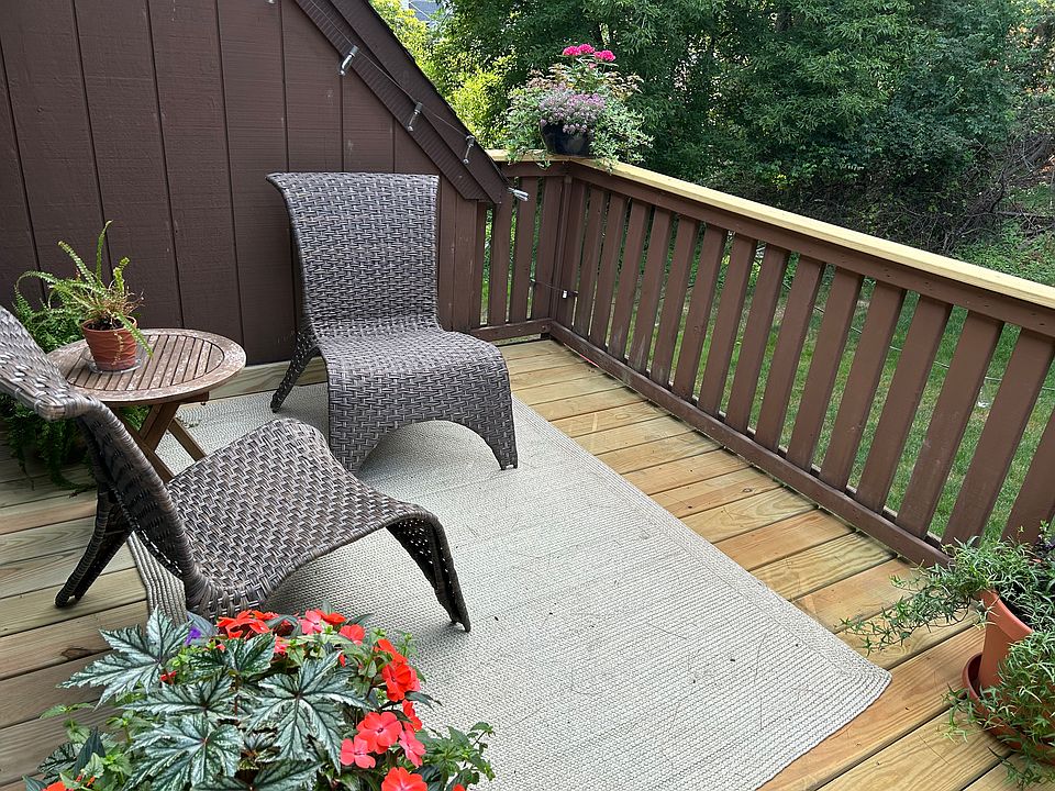 Back deck. Newly installed floorboards and railing tops.