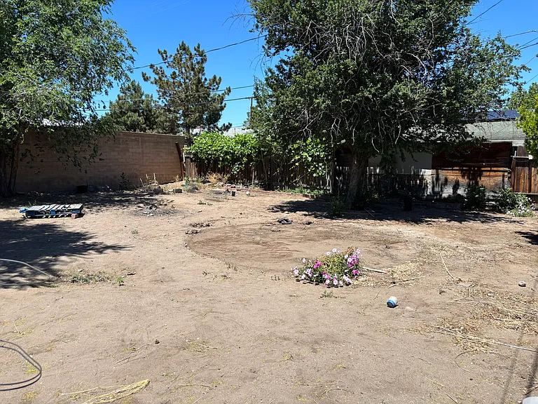 565 E Plumb Ln — Photo 8
