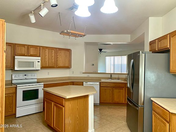 5th image of 22946 W DESERT BLOOM Street