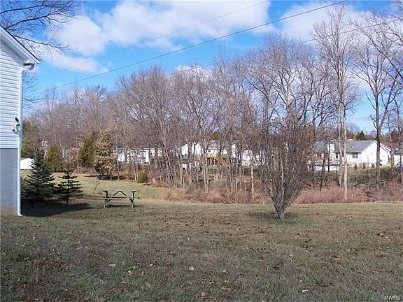 Nearly 3/4 acre lot with trees