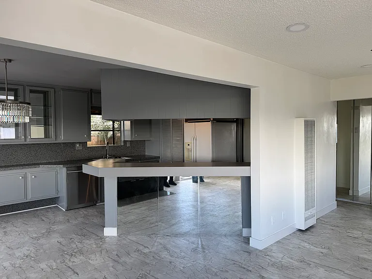 Living room facing kitchen